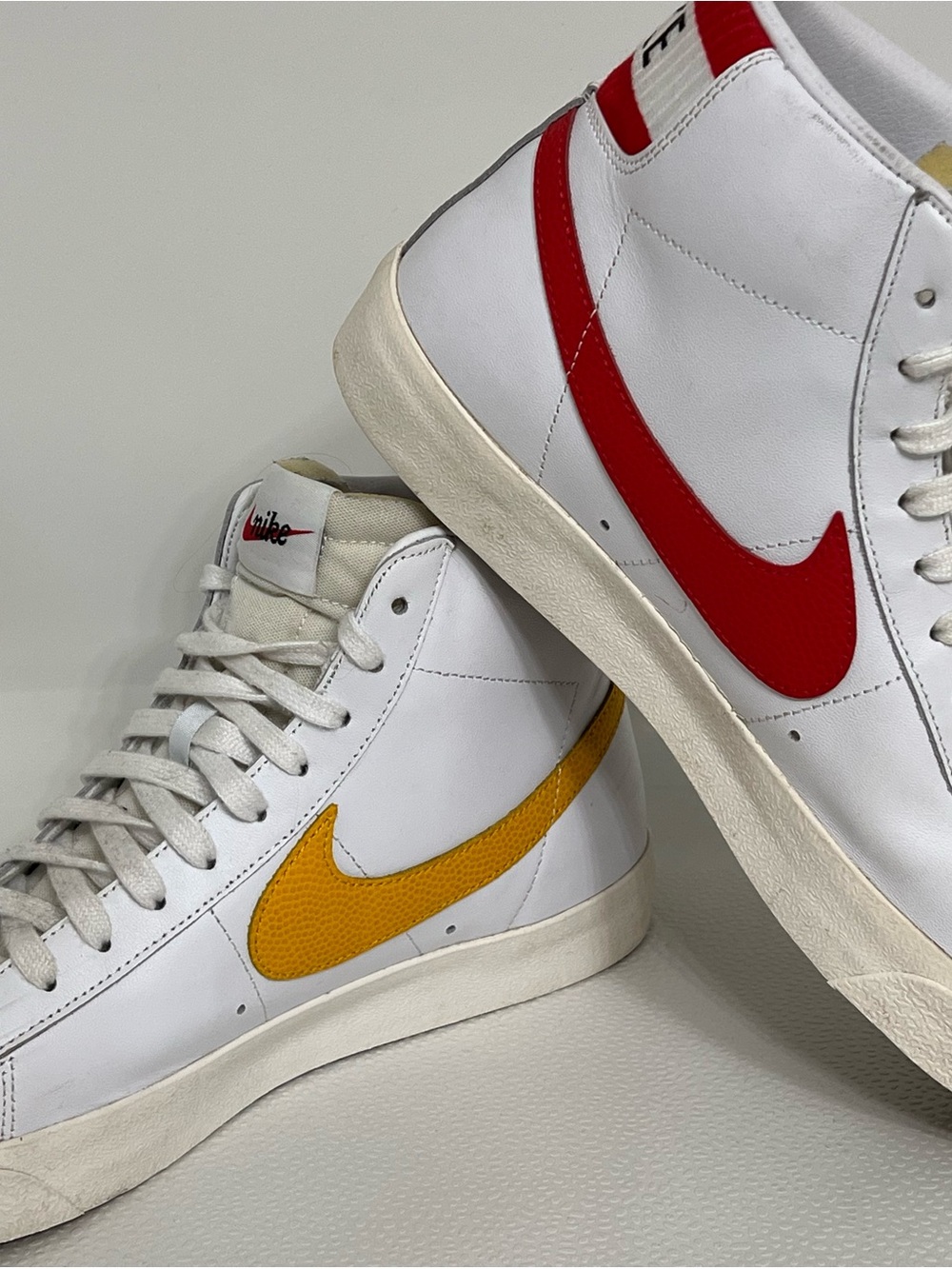 Nike White High-Top Sneakers with 4 color Swooshes